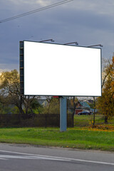 White billboard along the highway. Background for design and advertising.