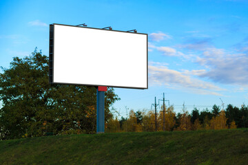 White billboard along the highway. Background for design and advertising.