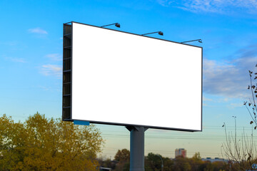 Background for design. Advertising billboard along the road in the city on a sunny day