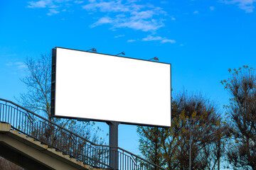 Large white billboards for outdoor advertising and information boards along the roads and on the streets of the city. 