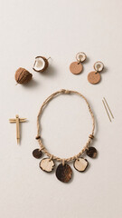 Flat lay of zero-waste jewelry with natural clay, coconut pieces, and hemp cord &mdash; elegant minimal styling for sustainable accessory line