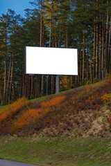 Background for design. Advertising billboard along the road in the city on a sunny day