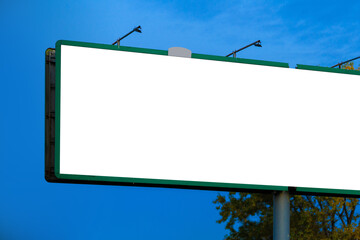 Advertising billboard along the road in the city. Background for design. 