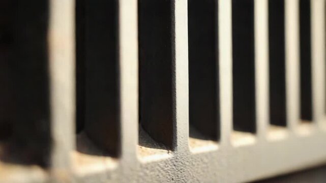 Close-up of aged metal grate