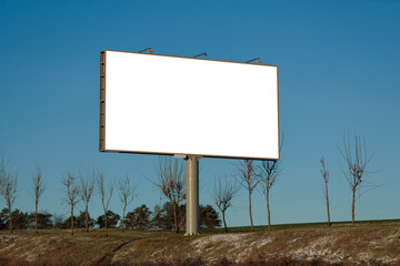 Advertising billboard along the road in the city. Background for design. 