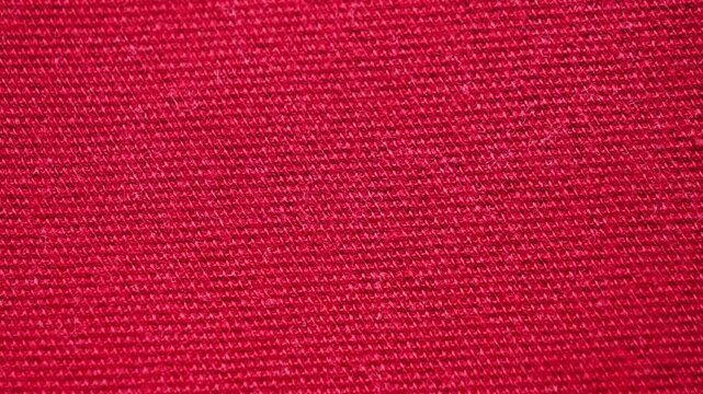 Soft red cotton. The concept of design, natural fabrics for comfortable everyday. High quality 4k footage