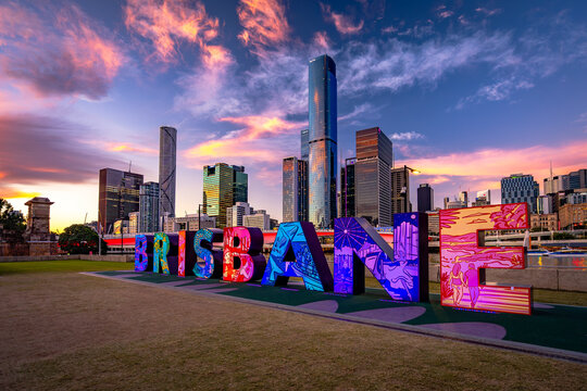 Brisbane, QLD, Australia - Jun 14, 2025: Updated Brisbane sign with the city in the background at sunset