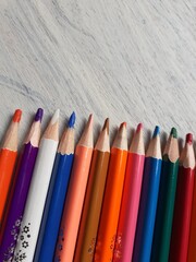 colored pencils on white background