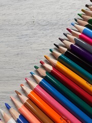 colored pencils on white background