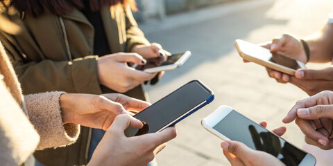 Group of people who use smartphones in concept of communication through mobile internet and convenient and fast teamwork