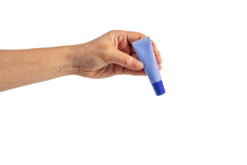 Purple packaging for cream, sunscreen or serum in hand on transparent background.