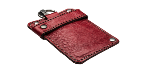 Red Leather Keychain Holder With Metal Rivets. Stylish Accessory For Keys And Small Items Isolated On Transparent Background