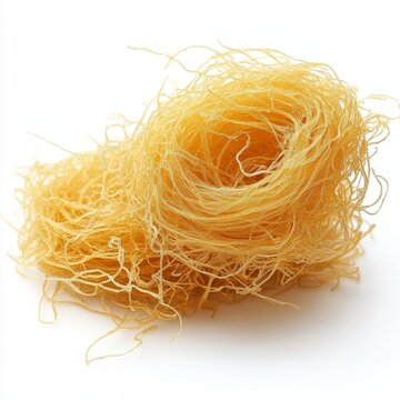 Golden curly kadaif (angel hair pastry) on a white background 