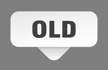 old sticker. old sign isolated on gray background