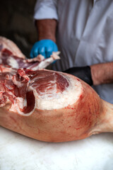 Butcher working on the stall
