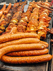 Large assortment of grilled sausages and kebabs at  Cracow christmas market