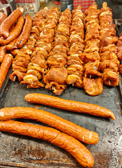 Large assortment of grilled sausages and kebabs at  Cracow christmas market