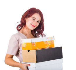 Young redhead woman carrying shopping boxes isolated on transparent background. Contented female portrait