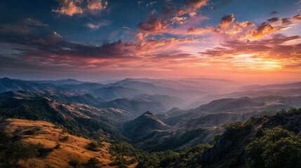Fototapeta premium Golden Sunrise Over Rolling Mountains