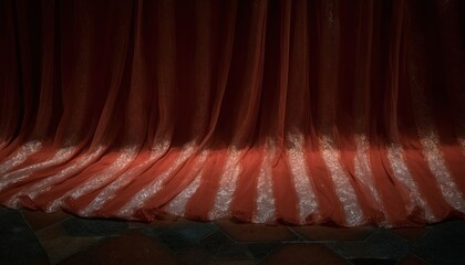 Deep red stage drapes, textured folds