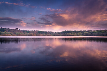 Sunset over lake water