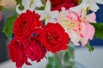 landscape with roses in a vase with selective focus