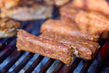 steak meat on a hot grill set to cook