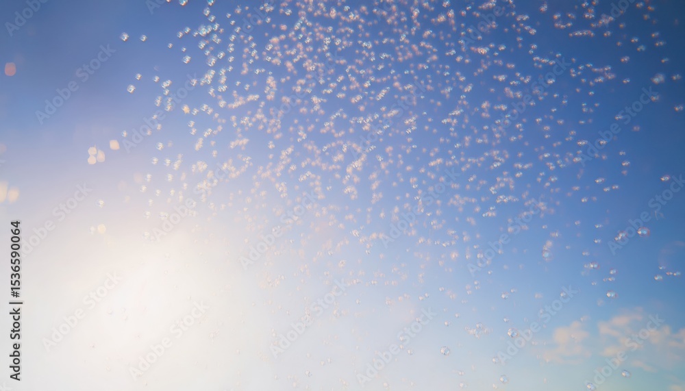 Poster sunlit soap bubbles floating against clear blue sky with soft sunlight flare and dreamy bokeh effect