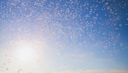 Obraz premium sunlit soap bubbles floating against clear blue sky with soft sunlight flare and dreamy bokeh effect, ideal for web design, background texture, print media, or creative branding visual