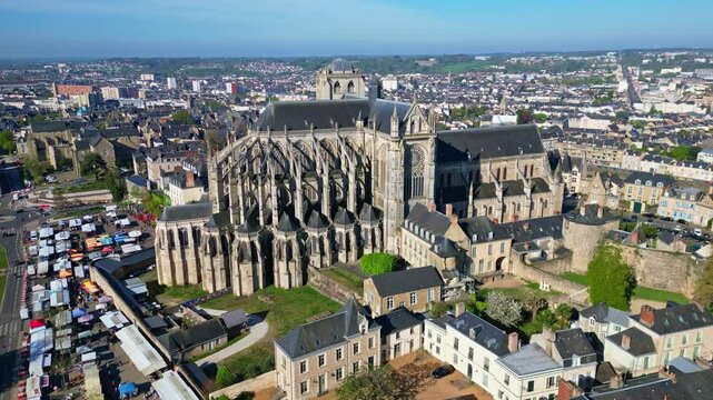 Historic city of Le Mans, with Cathedrale Saint-Julien and surrounding urban area, Sarthe, France. Aerial drone circling