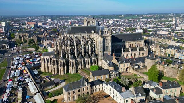 Historic city of Le Mans, with Cathedrale Saint-Julien, March&eacute; des Jacobins and surrounding urban area, Sarthe, France. Aerial drone lateral view