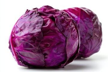 Obraz premium Two Red Cabbages on White Background, Representing Healthy Eating and Fresh Produce for Grocery Store Advertising : Generative AI