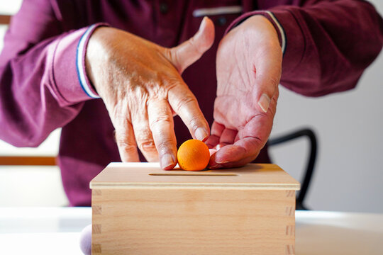 Close-up of hands during occupational therapy session.