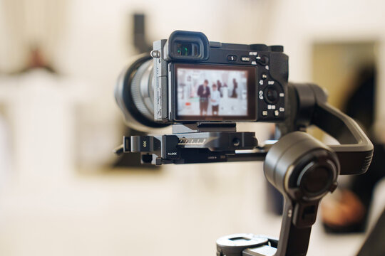 A professional black camera for taking photos and videos at the holiday. 