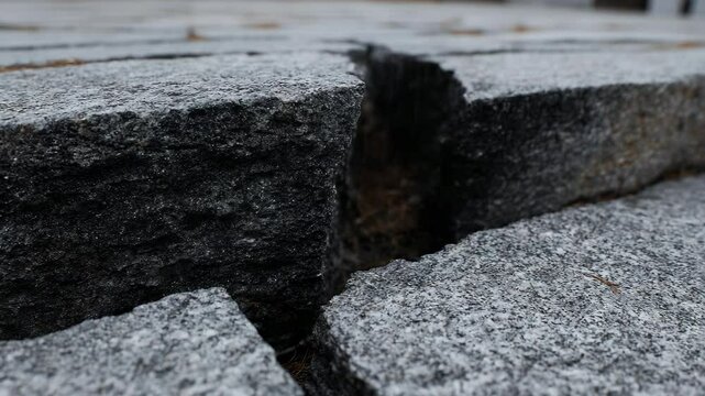 Close-up of layered gray stone blocks