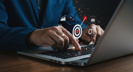 Businessman using laptop with target and arrow icons symbolizing business success and strategic planning
