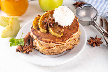 Sweet autumn apple pie pancakes stack with ice cream