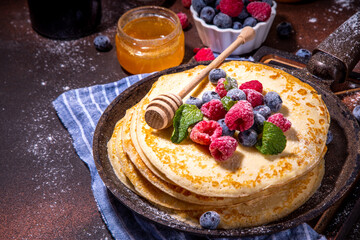 Crepes pancakes with berry