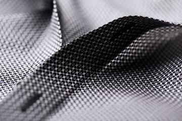 Close up of dark Men's shirt. Soft focus. Copy space.	