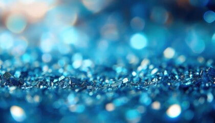 shimmering blue glitter macro with sparkling bokeh light in soft focus ideal for website background, luxury branding, festive print design, or abstract texture