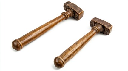 Two antique wooden-handled bronze hammers isolated on white.