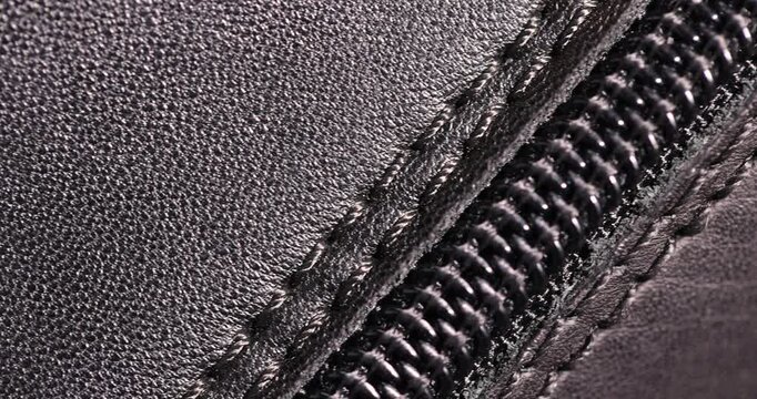 leather with a zipper for joining, which is used for the manufacture of shoes and other products, genuine leather painted black with seams