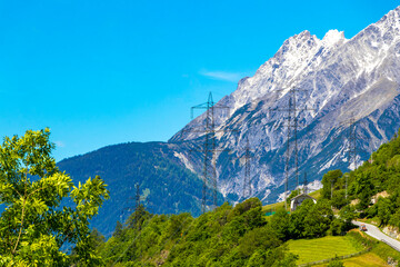 Lechtal Austria alpine mountain landscape panorama blue sky and snow.