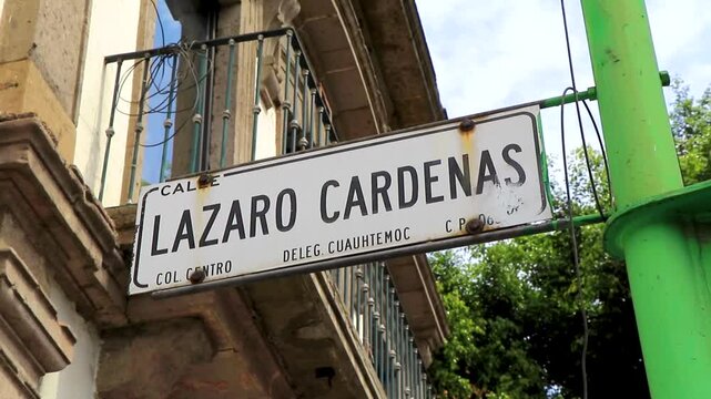 White Lazaro Cardenas city street road sign in Mexico City.
