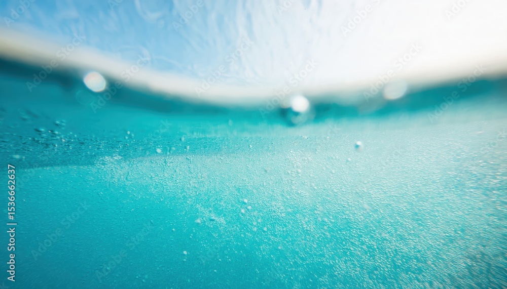 Poster underwater view of clear turquoise ocean surface with rising bubbles and sunlit waves for aquatic br