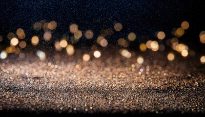 shimmering gold glitter dust in soft bokeh light with black background for luxury design, holiday branding, elegant website banner or festive print media

