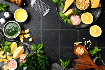 Homemade traditional pesto sauce and ingredients. Top view.