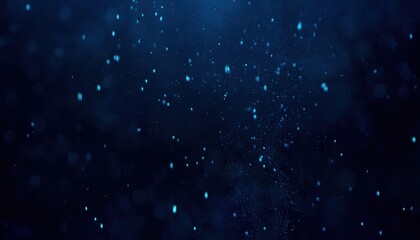 Fototapeta premium dark blue underwater particles floating in motion blur with glowing bokeh effect and dreamy depth for website background, print poster, or branding texture