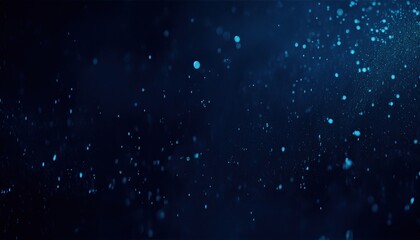 Fototapeta premium dark blue underwater particles floating in motion blur with glowing bokeh effect and dreamy depth for website background, print poster, or branding texture