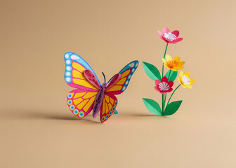 Obraz premium Colorful paper butterfly and flowers on beige background